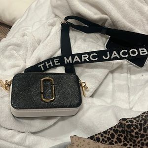 Never used authentic Marc Jacob cross body bag black and burnt orange